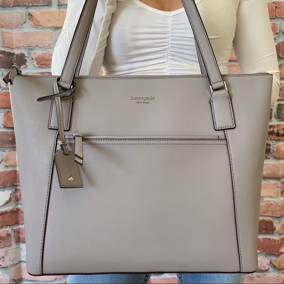 kate spade Handbags - Kate spade LARGE Cameron pocket tote soft taupe